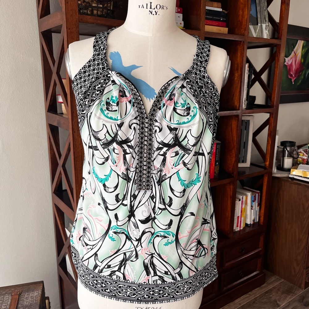 White House Black Market sleeveless blouse with swirls pattern and beadwork